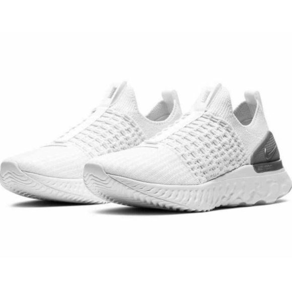 triple white nike phantom reacts